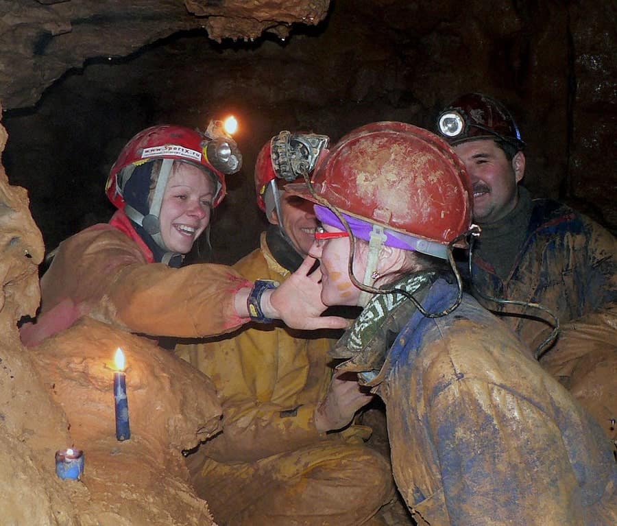 group of cavers with headlamps